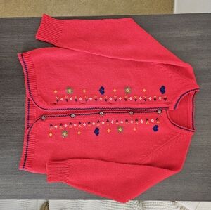 Red toddler sweater with button closure